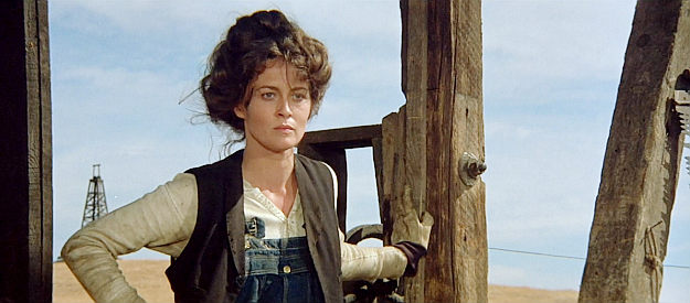 Faye Dunaway as Lena Doyle, on the oil rig she's determined to keep as her own in Oklahoma Crude (1973)