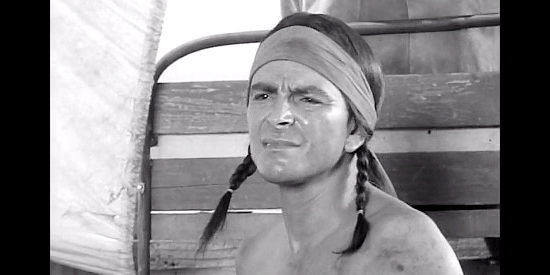 George Steele as Jaqui, the injured Indian the travelers find in The Tall Texan (1953)