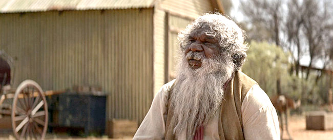 Gibson John as Archie, testifying at Sam Kelly's trial in Sweet Country (2017)