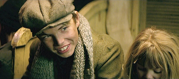 Jackson Presley as Charlie Calgrove, on the orphan train in Hostile Territory (2022)