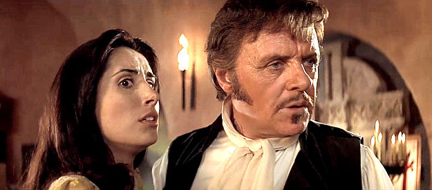 Julieta Rosen as Esperanza and Anthony Hopkins as her husband Don Diego De La Vega, about to be interrupted by Montero and his men in The Mask of Zorro (1998)