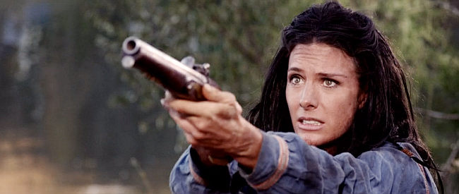 Kelly Grayson as Barbara Leininger, remembering her father's long-ago lesson in how to fire a pistol in Alone Yet Not Alone (2013)