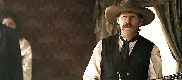 Lew Temple as David Harding, eager to collect a gambling debt once Dunnigan strikes gold in Murder at Yellowstone City (2022)