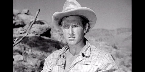 Lloyd Bridges as Ben Trask, bound for an El Paso jail until a gold nugget changes those plans in The Tall Texan (1953)