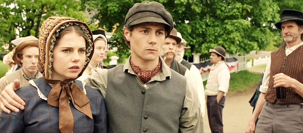 Lucy Boynton as Esther Hagadorn and Augustus Prew as her brother Ni (Augustus Prew) watch Jeff and his friends march off to war in Copperhead (2013)