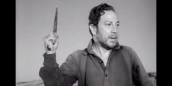 Luther Adler as Joshua Tinnen, overtaken by greed in The Tall Texan (1953)