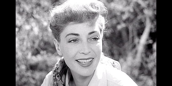 Marie Windsor as Laura Thompson, dreaming of starting a new life with the gold she's found in The Tall Texan (1953)