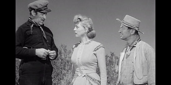 Marie Windsor as Laura Thompson, informing Capt. Bess (Lee J. Cobb) and Carney (Syd Saylor) that she intends to go along on the search for gold in The Tall Texan (1953)