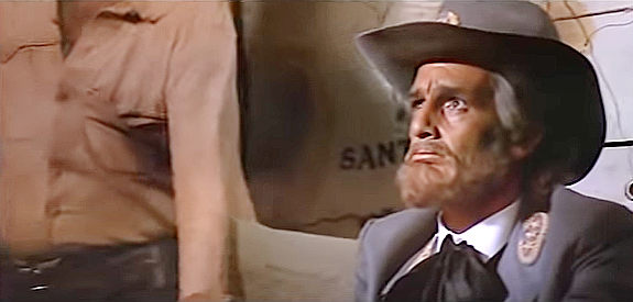 Philippe Leroy as Gen. Briscott, the half-mad commander who's supposed to receive the gold in Panhandle 38 (1972)