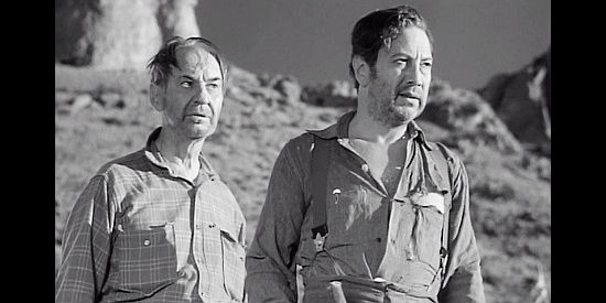 Syd Saylor as Carney and Luther Adler as Joshua Tinnen, wondering about the Indian burial ground in The Tall Texan (1953)