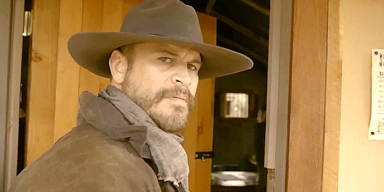 Thom Hallum as Deacon, John Dooling's new hired gun in The Bounty Men (2022)