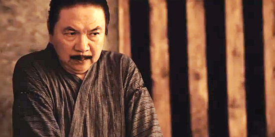 Vint Carmona as Namagashi, the man who urges Kurukan to continue the hunt in The Last Wolf of Ezo (2015)