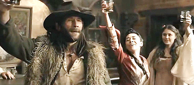Zach McGowan as Robert Dunnigan, celebrating a gold strike in Murder at Yellowstone City (2022)