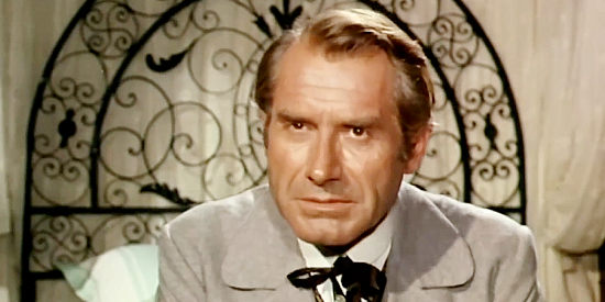Andrea Bosic as Bryan Talbot, a man determined to become senator no matter what in Death Rides Along (1967)
