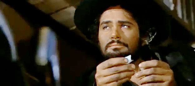 Brett Halsey (Montgomery Ford) as Fred Leinster, meeting Manuel's men in Twenty Thousand Dollars for Seven (1968)