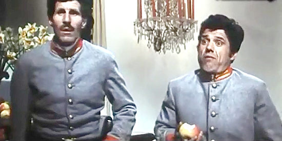 Ciccio Ingrassia as Ciccio La Pera and Franco Franchi as Franco La Perra, posing as Rebel soldiers in Two Sergeants for General Custer (1965)