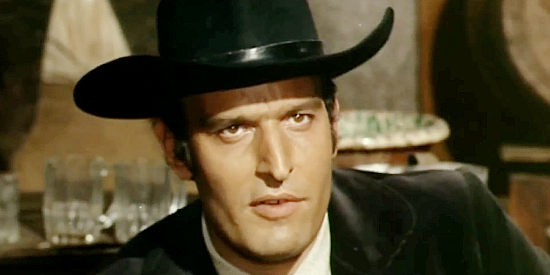 Claudio Undari (Robert Hundar) as Luke Prentiss, the gunman Dolores persuads to help stop the Pony Express rider in Death Rides Along (1967)