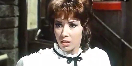 Dina Loy as Mary, the colonel's daughter, learning her locket has been found at Confederate headquarters in a trap in Two Sergeants of General Custer (1965)