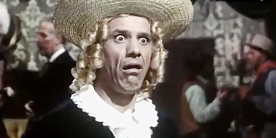 Franco Franchi as Franco La Pera, disguised as a child in need of medical attention in a trap in Two Sergeants of General Custer (1965)
