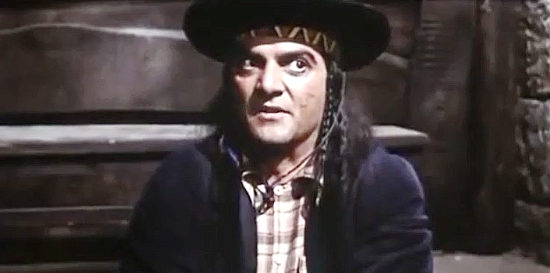 Franco Giacobini as Chochise, visiting Franco and Ciccio in confinement in a trap in Two Sergeants of General Custer (1965)