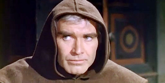 Frank Branna as Brad, posing as a monk in order to fool a reverend in Three Supermen of the West (1973)