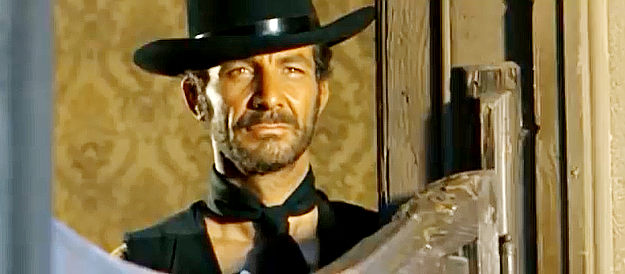 Gino Marturano as Chaco, spotting a man the bandits have been searching for in Twenty Thousand Dollars for Seven (1968)