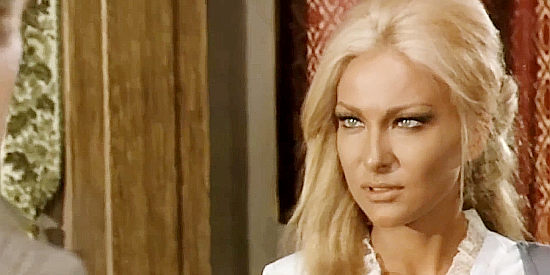 Helene Chanel as Dolores Talbot, in a confrontation with her much older husband in Death Rides Along (1967)