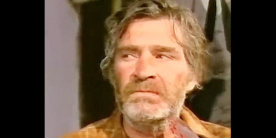 James Philbrook as Sam, forced to watch his wife being manhandled by Tex in If You Shoot ... You Live (1975)