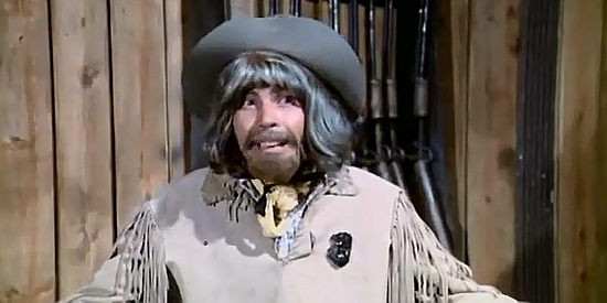 Jose Canalejas as Buffalo Bill, a sheriff's deputy practicing his gun tricks in Three Supermen of the West (1973)