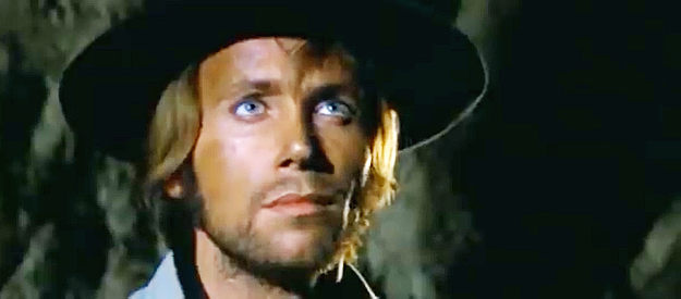 Marco Gobbi as Joe, a member of the outlaw gang that kidnaps a young boy in Twenty Thousand Dollars for Seven (1968)