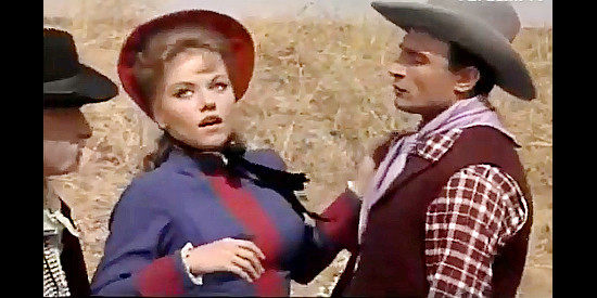 May Heatherly as Ruth, swooning after a kiss from the bandit El Malo in Torrejon City (1962)