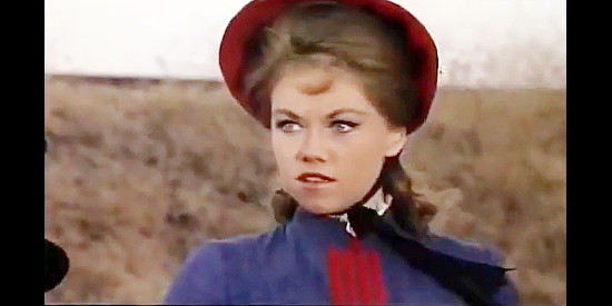 May Heatherly as Ruth, watching El Malo and his bandits rob the train she was aboard in Torrejon City (1962)