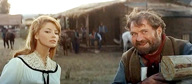 Mercedes Alonso as Dorothy Power and Robert Camardiel as Alonzo Almodoros, watching riders approach in Son of Jesse James (1965)