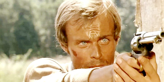 Mike Marshall as Bobby Kent, taking aim at one of Talbot's fleeing henchmen in Death Rides Along (1967)