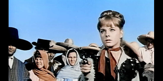Mili (Emilia Bayona) as Sally, ready to demonstrate her six-gun skill in Two Guns for Two Twins (1966)