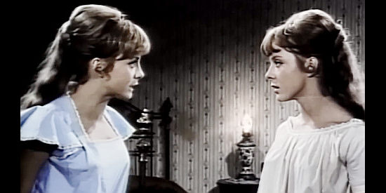 Pili (PIlar Bayona) as Jennny and Mili (Emilia Bayona) as Sally, realizing their grandpa has slipped out to play poker again in Two Guns for Two Twins (1966)