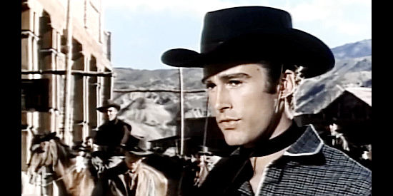 Sean Flynn as Jimmy, son of Slatery, coming to Monahan's defense in Two Guns for Two Twins (1966)
