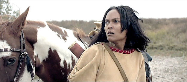 Tanajsaia Slaughter as Dowanhowee with the horse she stole back from Wilder's gang in Black Wood (2022)