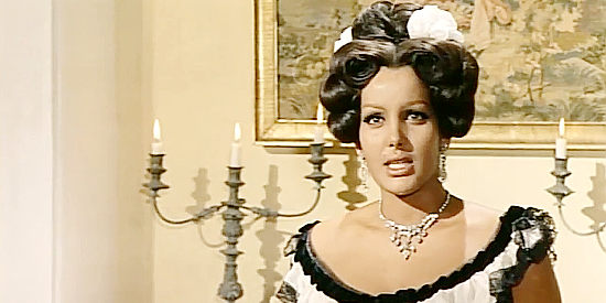 Agata Flori as Carmencita, befuddled when three Zorros show up in her room in The Two Nephews of Zorro (1969)