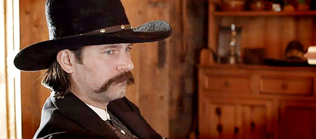 Braden Anderson as Wyatt Earp, reflecting on his years in Tombstone in 30 Seconds in Hell (2021)