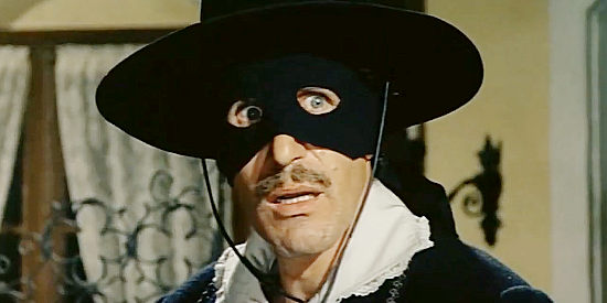 Ciccio Ingrassia, pretending to be Zorro in order to impress Carmencita in The Two Nephews of Zorro (1969)