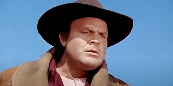 Dan Blocker as John Killibrew, catching a glimpse of the lake the steam engine fell into in Something for a Lonely Man (1968)