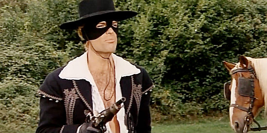 Dean Reed as Zorro, realizing he's rescued two jokesters, not two wronged men, in The Two Nephews of Zorro (1969)