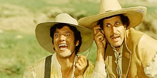 Franco Franchi as Franco La Vacca and Ciccio Ingrassia as Ciccio La Vacca, thinking they've struck gold when a gold watch comes floating down a creek in The Two Nephews of Zorro (1969)