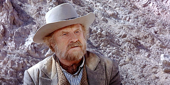 Jack Warden as Sheriff Henry Gifford, a lawman hellbent on bringing two 'cheap' outlaws to justice in Billy Two Hats (1975)