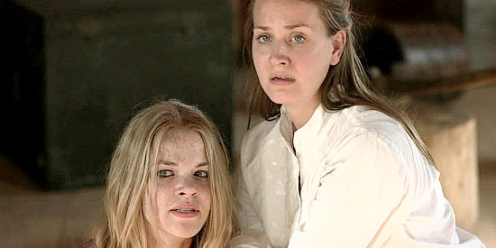 Jennifer Kendall as Bethany and Andrea Flowers as Clara O'Neal, cornered as they try to escape in Death and Compromise (2019)