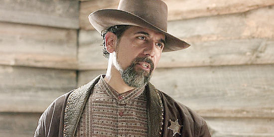 Michael J. Rodriguez as Sheriff Morales, confronting his prey in Death and Compromise (2019)