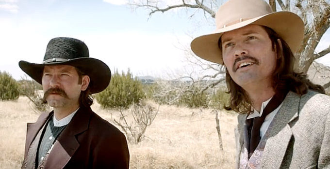 Braden Anderson as Wyatt Earp and Ryan Knudson as Doc Holliday, finding their way to Destiny's Saloon in 30 Seconds in Hell (2021)