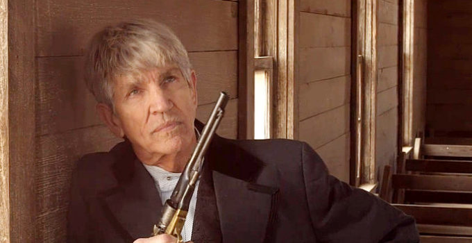 Eric Roberts as Pastor John Corell, contemplating revenge on his own in A Town Called Parable (2022)