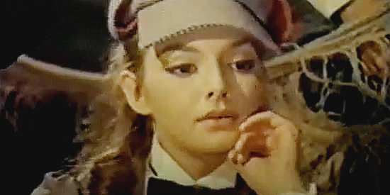 Rosemarie Dexter as Miss Baxter, contemplating the quintet's next move in In the Name of the Father (1969)